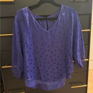 White House Black Market blue top with subtle star print